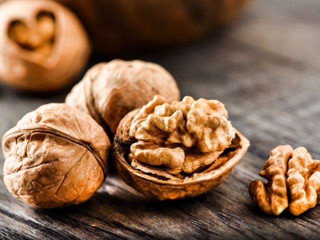 Why are walnuts known as the 'king' of nuts?